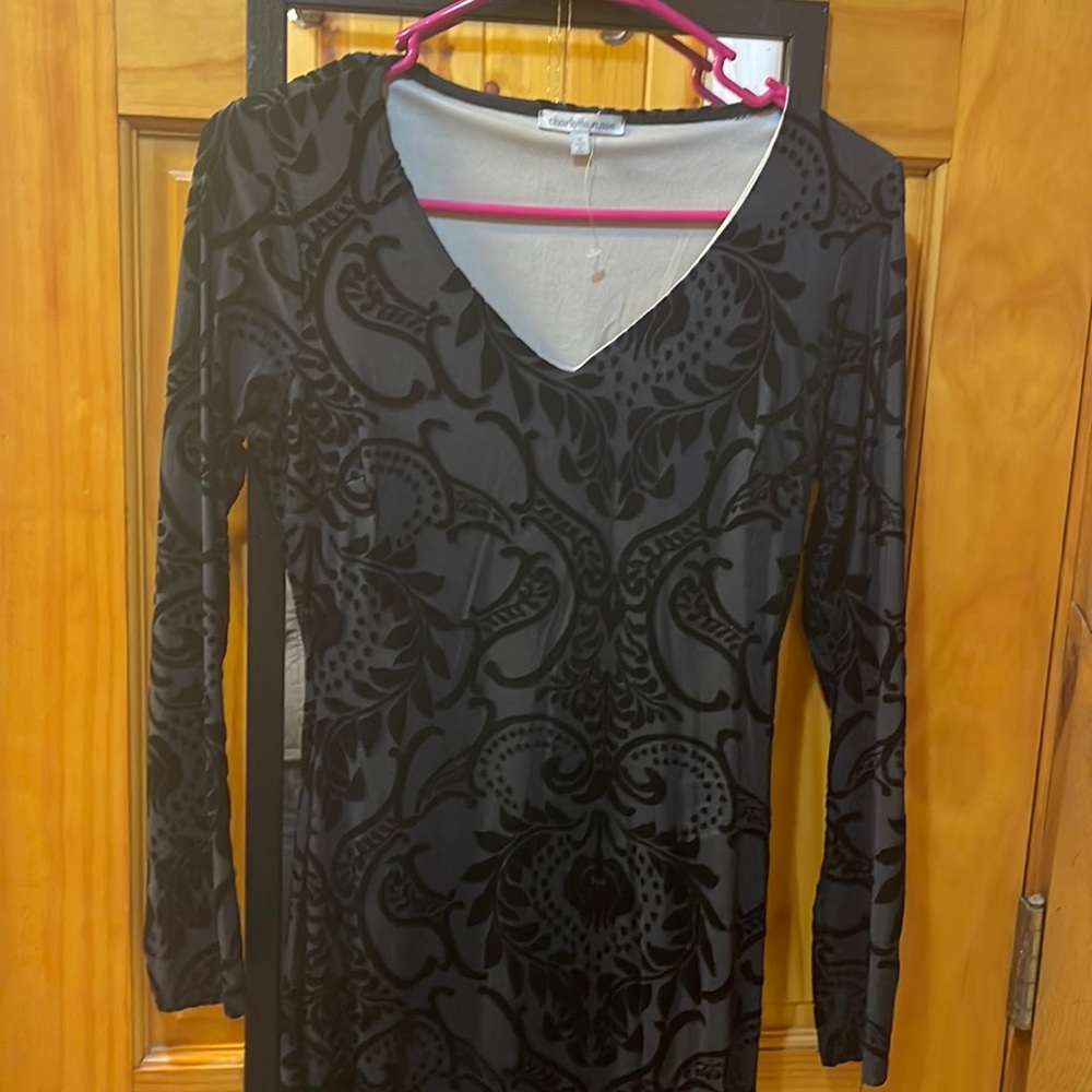 Black dress with designs , never been worn
